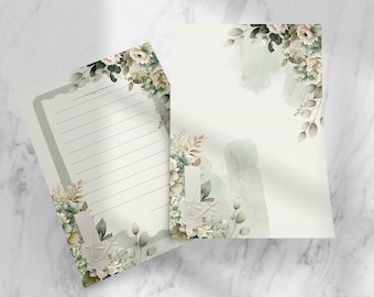 Könnte beinhalten: Ein Set aus zwei leeren Briefkarten mit einem grünen und weißen Aquarell-Blumendesign. Die Karten haben einen linierten Schreibbereich und einen dekorativen Rand.