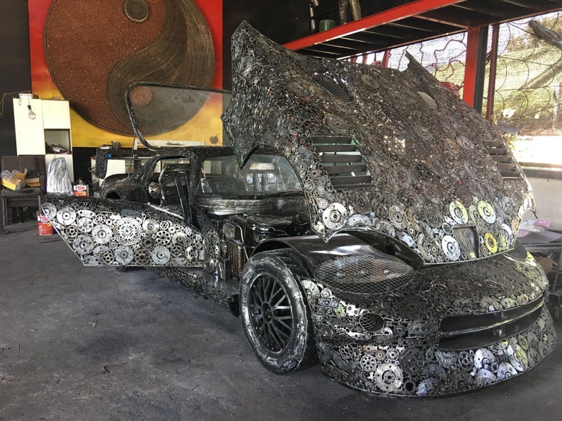 handcrafted-sculpture-work-of-art-welded-metal-recycled-mechanical