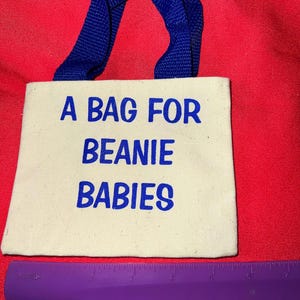 Vintage canvas babybeanietas blauwe letters - zie foto's voor afmetingen