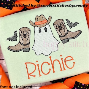 May include: A light green embroidered design featuring a ghost wearing a cowboy hat and cowboy boots, with bats on either side. The name "Richie" is embroidered in orange script below the design. Text at the top reads "Stitched by @sweetstitchesbywendy".