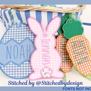 May include: Easter-themed gift tags in the shape of an egg, bunny, and carrots. The egg tag is blue and white gingham with the name "Noah". The bunny tag is pink gingham with the name "Lennon". The carrot tags are orange gingham with the name "Aiden".
