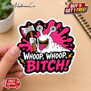 May include: A die-cut vinyl sticker featuring a white cartoon slug with a wide grin, a pink tongue, and two eyes on stalks. The slug holds a small axe against a vibrant pink splatter background. The text reads WHOOP, WHOOP, BITCH! in bold letters.