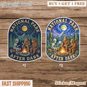 May include: Two National Park stickers/magnets with a camping theme. One shows an alien, Bigfoot, and a bear around a campfire under a starry night sky. The other features the same characters with a mountain backdrop. The text "AFTER DARK" is included.