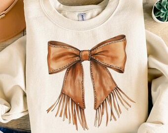 Western Cowgirl Bow Sweatshirt, Howdy Brown Leather Bow Shirt, Cowhide bow Shirt, Coquette Cowgirl aesthetic Shirt, Cowgirl Bow Shirt