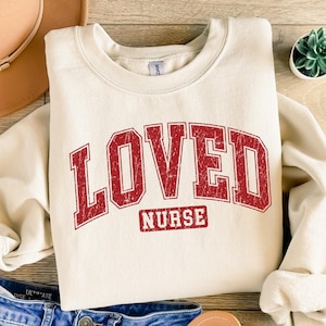 Loved Nurse Sweatshirt, Nurse valentine shirt, Valentine Sweatshirt, ER Nurse Shirt, Nursing Gifts, Valentine Sweater, Gift for Nurse
