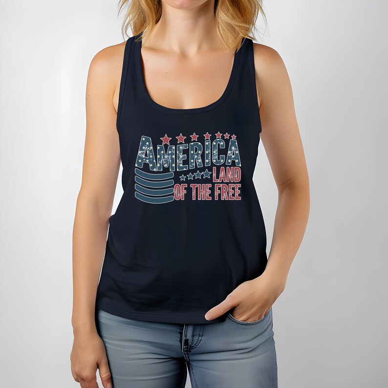 a woman wearing a tank top that says america land of the free