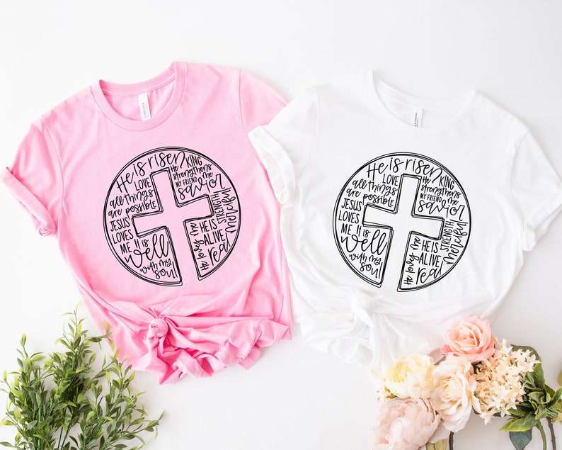 two t - shirts with a cross on the front and a cross on the back