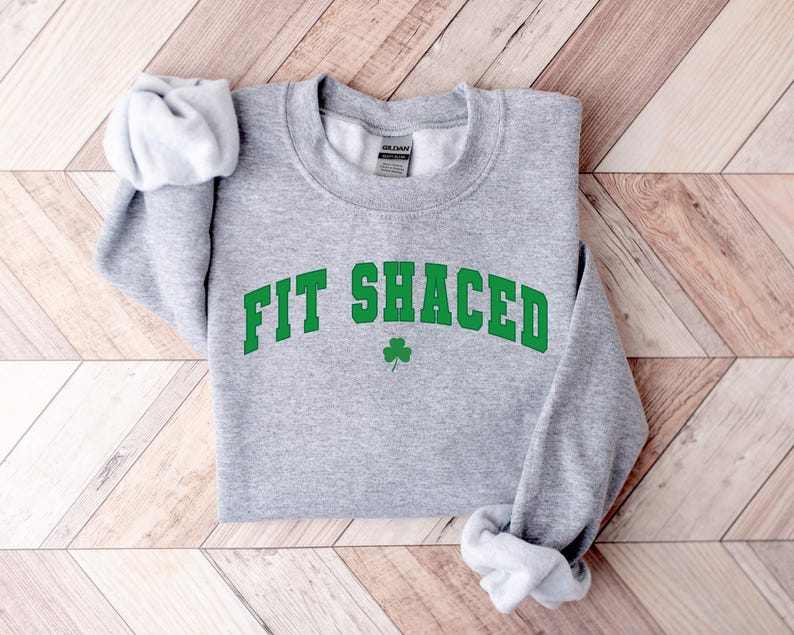 a sweatshirt with the word fit shacked printed on it