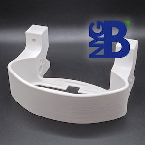 May include: White plastic 3D printed bracket with a curved front and a rectangular back. The bracket has a small hole on the top and several holes on the back.