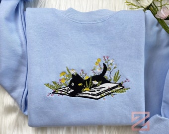 Embroidered Cute Cat Lying On Book With Flower Sweatshirt | Flower With Cat Embroidered Hoodie | Book Lover T-Shirt | Crew Neck Sweatshirt