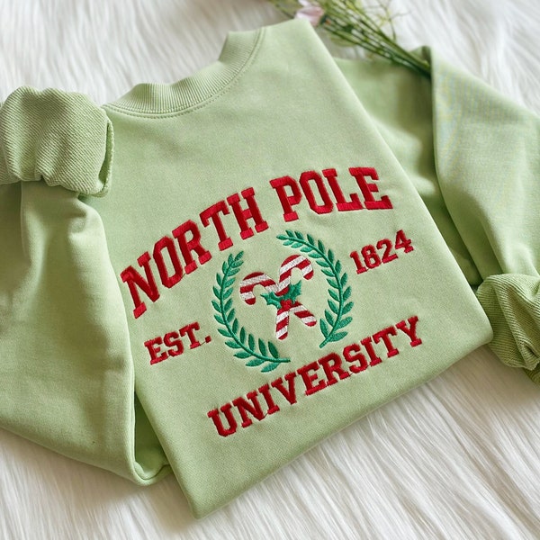 North Pole Universität Besticktes Sweatshirt | Weihnachten bestickter Hoodie | Weihnachts-Süßigkeiten-Pullover | Rundhals Sweatshirt
