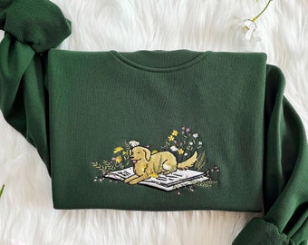 Embroidered Cute Dog Lying On Book With Flower Sweatshirt | Flower With Dog Embroidered Hoodie | Book Lover T-Shirt | Crew Neck Sweatshirt