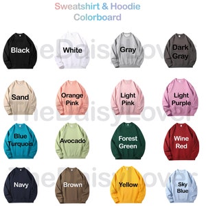 May include: Colourboard displaying 16 different sweatshirt and hoodie colours. The colours include black, white, grey, dark grey, sand, orange pink, light pink, light purple, blue turquoise, avocado, forest green, wine red, navy, brown, yellow, and sky blue.