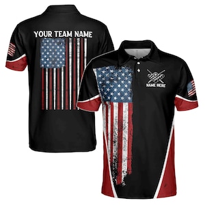 May include: Two black and red polo shirts with a distressed American flag design. The back of one shirt has the text "YOUR TEAM NAME" and a row of pool cues. The front of the other shirt has the text "NAME HERE" and a crossed pair of pool cues with billiard balls.