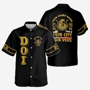 May include: Black button-down shirt with gold accents and text. The front features the letters "DOI" in gold. The back displays a gold emblem with text that reads "Your Court Name", "Oasis of Your City", and "Desert of Our State".