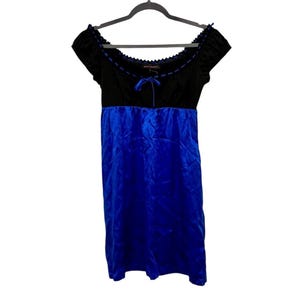 sachin and babi light blue dress A beautiful dress with full skirt and corset back- the 3D butterflies give  movement and romance to this unique and stunning dress from Betsey Johnson!  39 inches long bust midi length 28 main image 0