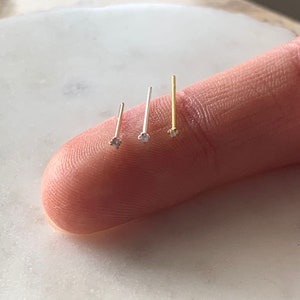 Teeny 1.25mm Nose or Ear Studs. Claw Set Gold, Silver or Rose Gold Teeny CZ Nose or Ear Studs . 925 Solid Silver. MINIMALIST PERFECTION.