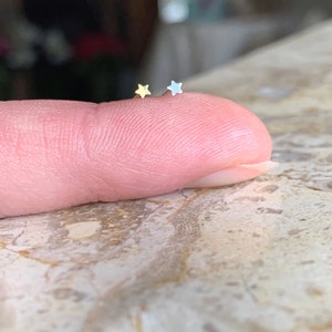 Teeny, Tiny Star Nose Stud. 925 Sterling 1.5mm Nose Stud. 24 Gauge Star Nose Stud Minimalist Nose Stud. Available in Gold or Silver.