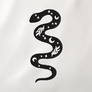 May include: Black embroidered snake design with white stars, crescent moons, and leaf accents. The snake is in a wavy pattern, set against a white background. The embroidery is detailed and creates a textured appearance.