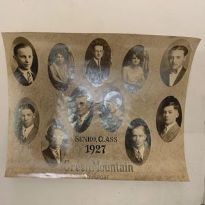 May include: Vintage sepia-toned photograph of the Senior Class of 1927 from Green Mountain. The image features oval portraits of students, with the text "Senior Class 1927" and "Green Mountain" visible.