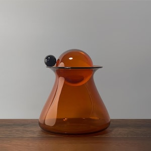 Decorative Amber Glass Container/Jar with Matching Glass Ball Lid and Orbital Obsidian Ball