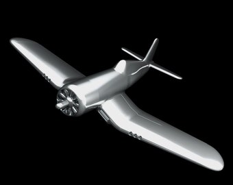 May include: A silver model airplane with a propeller and a black background.