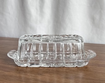 Burriera vintage in vetro trasparente pretagliato Anchor Hocking con coperchio