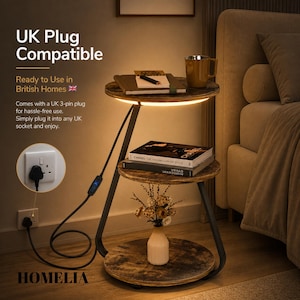 May include: A three-tier round side table with a dark wood grain finish and black metal frame. The top tier features an integrated LED light strip. The table includes a power cord with a UK 3-pin plug and a small controller. Text reads UK Plug Compatible.