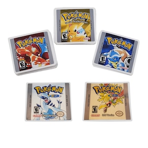 May include: Five different game cartridge labels for the Pokemon video game series. The labels are white with a blue, yellow, or red border. Each label features a different Pokemon character and the game title "Pokemon". The labels also include the game version, such as "Special Pikachu Edition", "Gold Version", and "Silver Version".