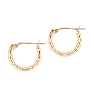 Huggie-ringoorbellen 14 kt goud