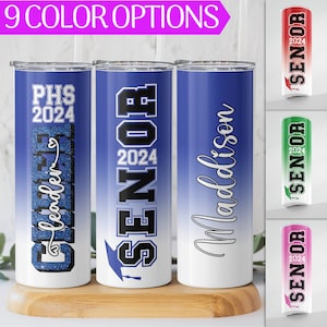 May include: Nine different color options for a personalized tumbler with a blue ombre design. The tumbler features the text "Senior 2024" and the text "PHS 2024" on one tumbler, the text "Senior 2024" on another tumbler, and the name "Maddison" on the third tumbler.