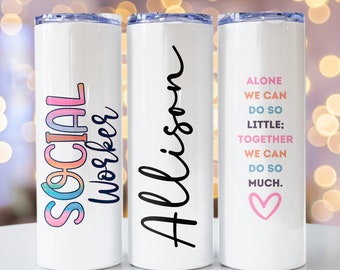 May include: Three white stainless steel tumblers with different designs. The first tumbler has the words "SOCIAL WORKER" in rainbow colors. The second tumbler has the name "Allison" in black script. The third tumbler has the text "ALONE WE CAN DO SO LITTLE; TOGETHER WE CAN DO SO MUCH." in pink, blue, and orange colors with a pink heart at the bottom.