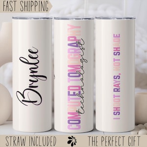 May include: White insulated tumbler with a silver lid. One tumbler has the name "Brynlee" in black script. Another has "COMPUTED TOMOGRAPHY technologist" in purple and pink. The third says "I SHOOT RAYS, NOT SHADE" in purple and pink.