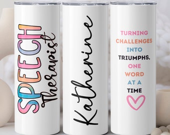 May include: Three white tumblers with colorful designs. The first tumbler has the words "SPEECH Therapist" in rainbow colors. The second tumbler has the name "Katherine" in black script. The third tumbler has the text "TURNING CHALLENGES INTO TRIUMPHS, ONE WORD AT A TIME" in colorful text with a pink heart at the bottom.