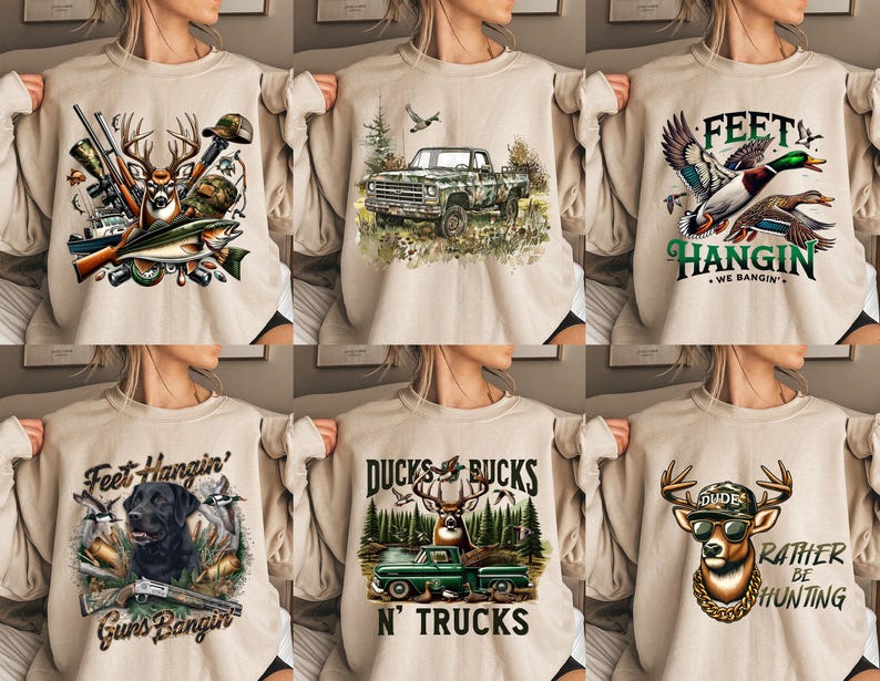Op de afbeelding: Zes verschillende ontwerpen van beige sweatshirts met verschillende jacht- en natuurthema's. De ontwerpen omvatten een hert met geweien, eenden, een vrachtwagen, een hond en een bok. De tekst op de sweatshirts is "Feet Hangin' We Bangin'," "Ducks & Bucks N' Trucks," "Feet Hangin' Guns Bangin'," en "Dude Rather Be Hunting."