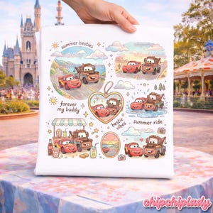 May include: White tote bag featuring colorful illustrations of the Cars characters Lightning McQueen and Mater. The design includes phrases like "summer besties" and "forever my buddy." The bag is held up by a hand.