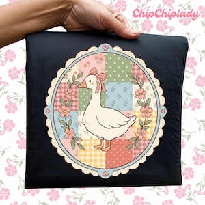 May include: A black pillowcase featuring a whimsical goose design. The goose is inside a floral and patchwork circle with a pink bow. The design includes pastel colors and the text "ChipChipLady" in the upper right corner.