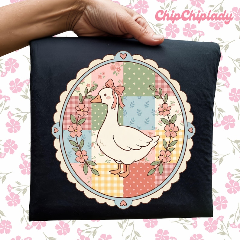 May include: A black pillowcase featuring a whimsical goose design. The goose is inside a floral and patchwork circle with a pink bow. The design includes pastel colors and the text "ChipChipLady" in the upper right corner.