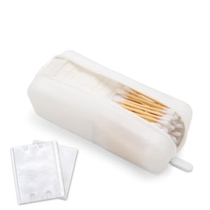 May include: A white, rectangular, zippered case containing cotton swabs and cotton pads. The case is open, revealing the contents. The cotton swabs have wooden sticks and white cotton tips. Two cotton pads are visible to the left of the case.