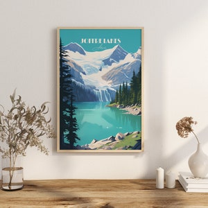 May include: A vintage-style travel poster featuring a scenic view of Joffre Lakes in British Columbia, Canada. The poster depicts a turquoise lake surrounded by snow-capped mountains and lush green trees. The text "Joffre Lakes" is displayed in a bold, retro font.