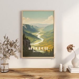 May include: A vintage-style travel poster featuring a scenic view of a river winding through a valley surrounded by mountains. The poster is titled "ACROPOLE Des Draveurs".