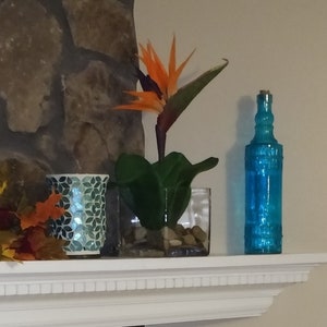 Faux Bird Of Paradise Arrangement With Distinctive Square Vase
