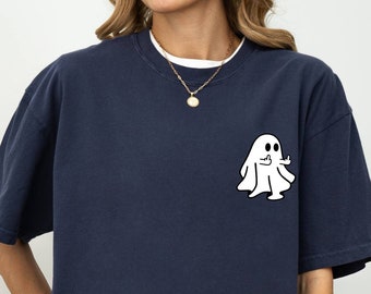May include: A navy blue oversized t-shirt with a white ghost graphic giving a thumbs up.