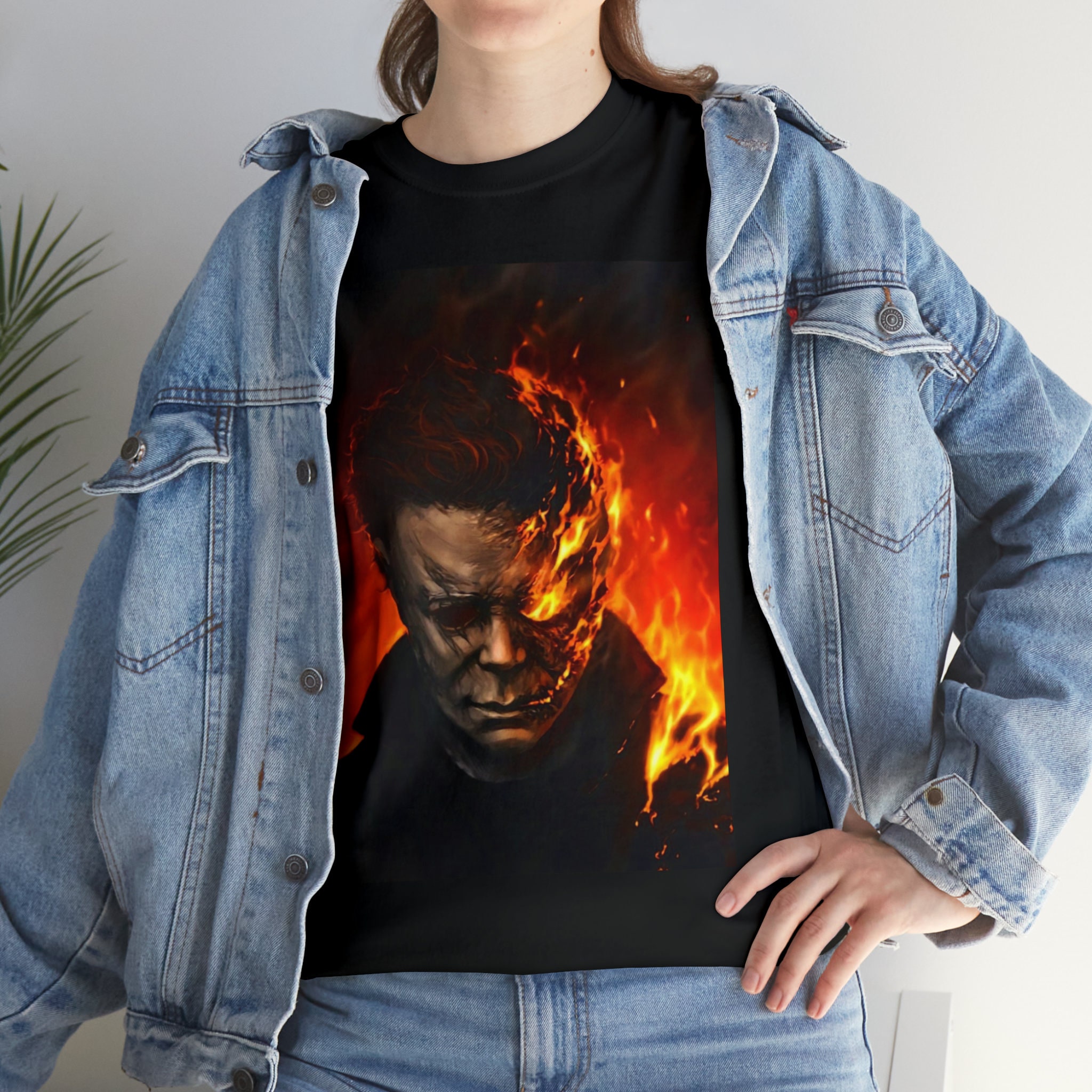 Discover Michael Myers Graphic Tee Creep into Style with our Horror Movie Graphic Tees: Spooky Shirts for Film Fanatics!