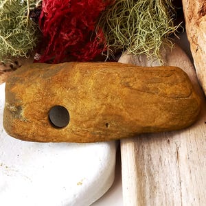 Witch Stone. Fairy Stone. Odin Stone. Serpent Stone. Natural treasures ideal for collecting, gifts, or crafts.