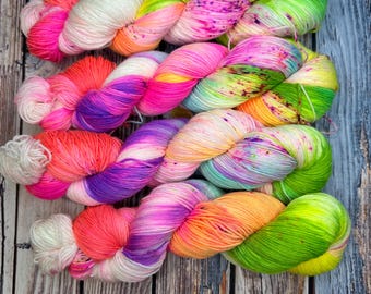 Neon Rainbow - superwash merino Hand-dyed Yarn.  Blacklight reactive.