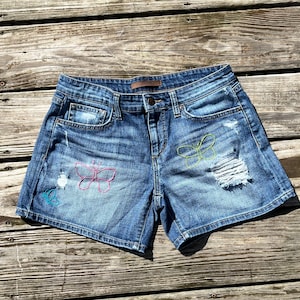 Hand embroidered vibrant butterfly jean shorts - size 28 - upcycled