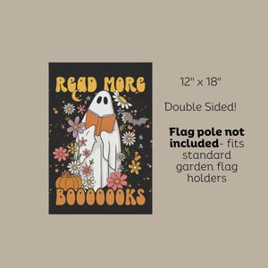May include: A double-sided garden flag, 12 x 18 inches, featuring a ghost reading a book, surrounded by flowers and a pumpkin. The flag has the words "READ MORE" and "BOOOOOKS" in orange.