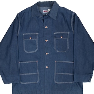 May include: A dark blue denim jacket with four front pockets and copper-colored buttons. The jacket has a collared neckline and white stitching details. The brand name "BIG MAC" is visible on the label.