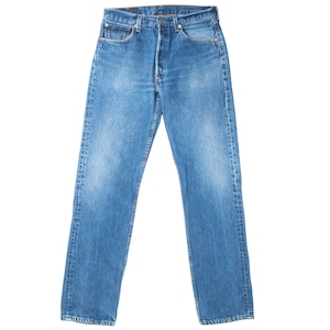 May include: A pair of blue denim jeans featuring a classic five-pocket design, a button fly closure, and a medium wash finish with subtle fading on the thighs. The jeans have a straight-leg cut with visible copper-toned rivets and stitching.